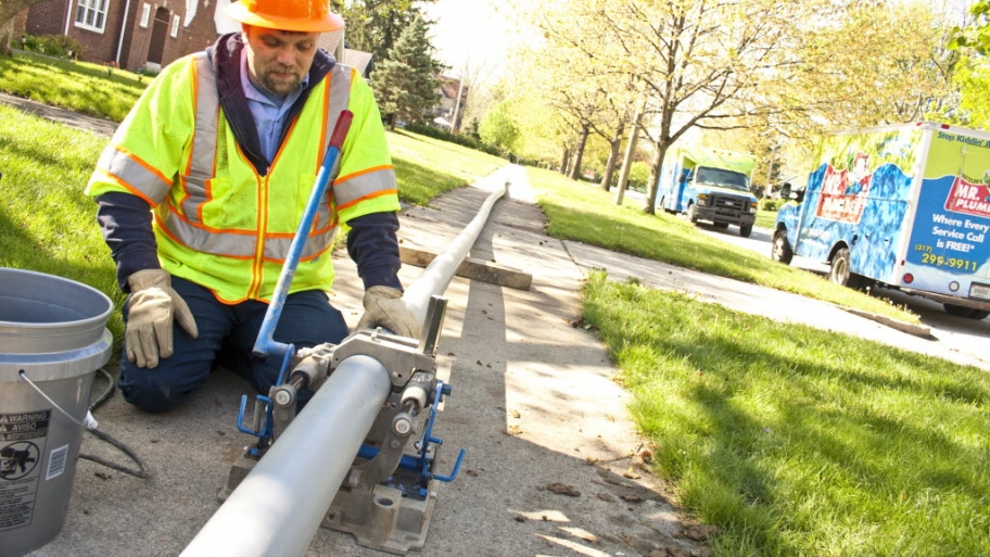 Sewer line worker
